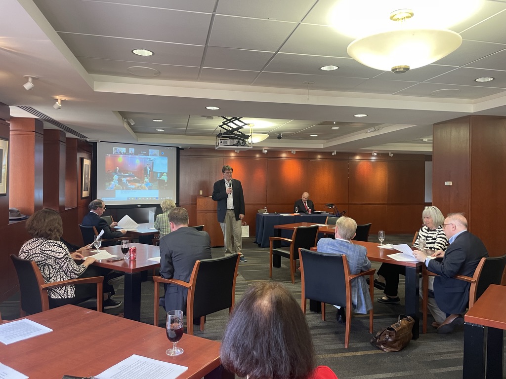 A group of people attending an event in the Faculty Conference Center in the law school